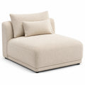 Divano componibile in tessuto beige con cuscini inclusi