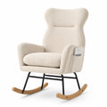 Sedia a dondolo in tessuto bouclé crema con struttura in metallo e base in legno